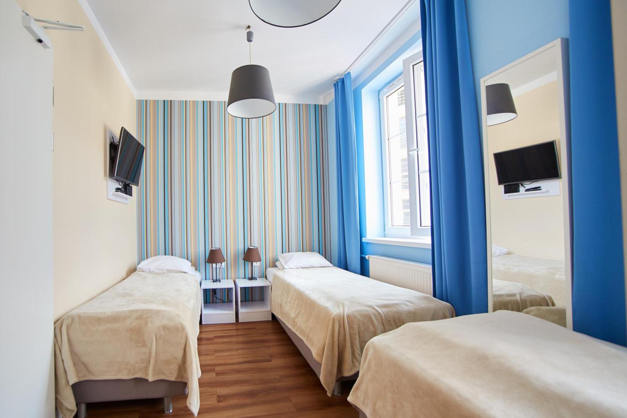 Deluxe Triple Room with Private Bathroom
