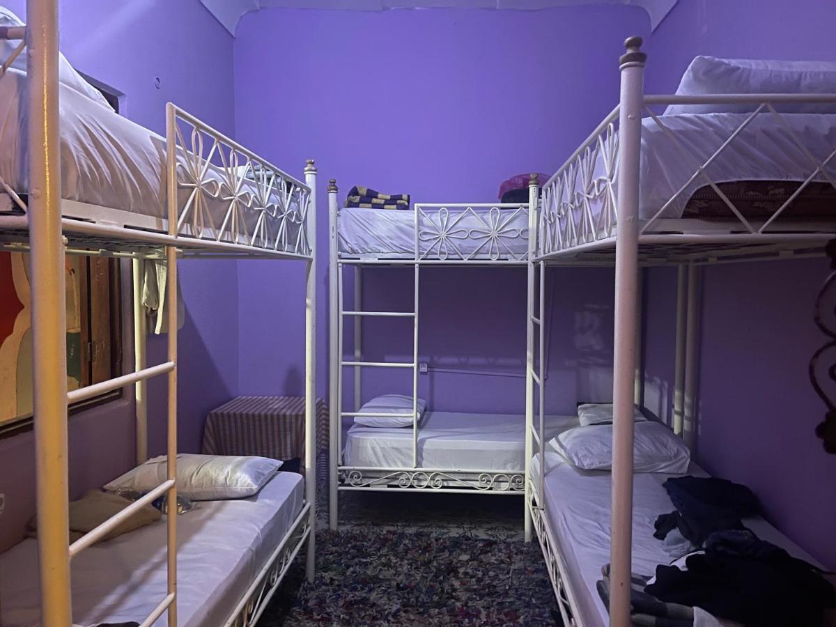 Single Bed in Dormitory Room