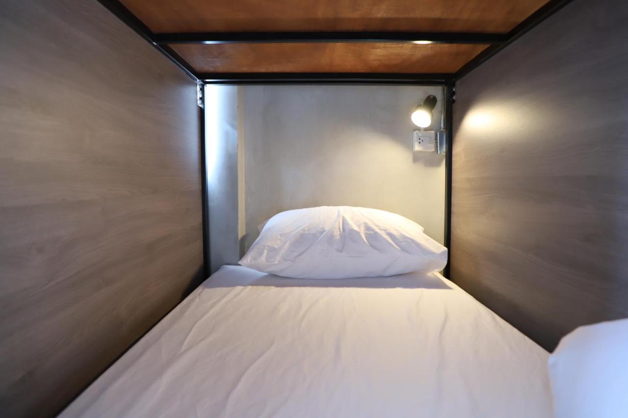 Single Bed in Dormitory Room