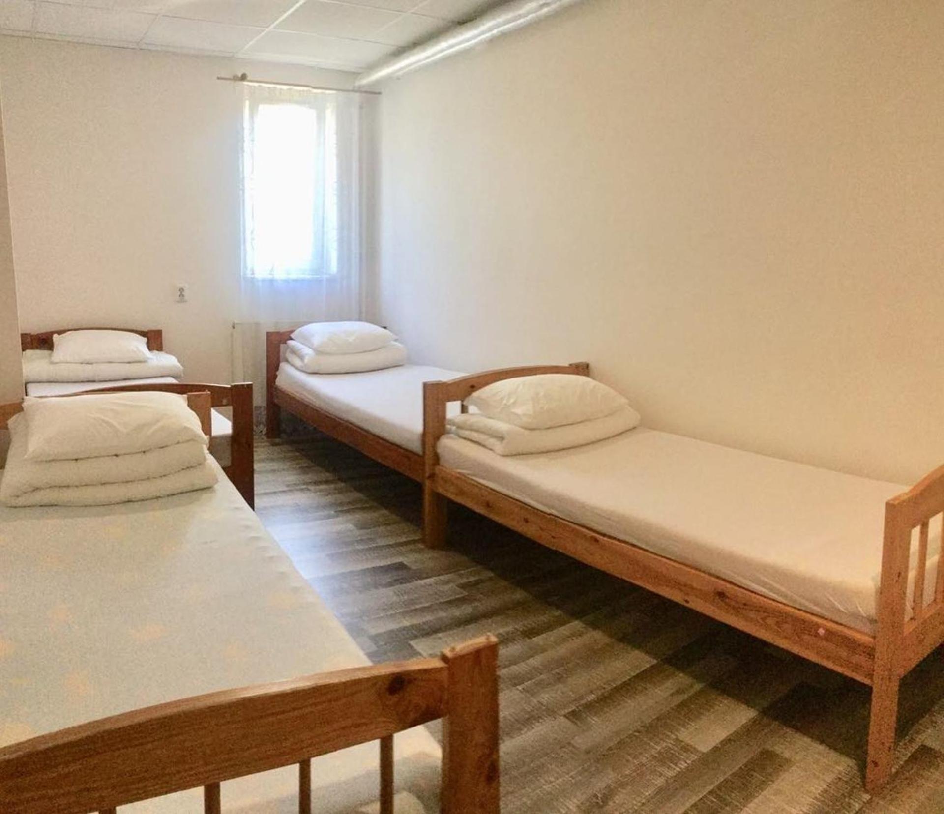 Single Bed in Dormitory Room