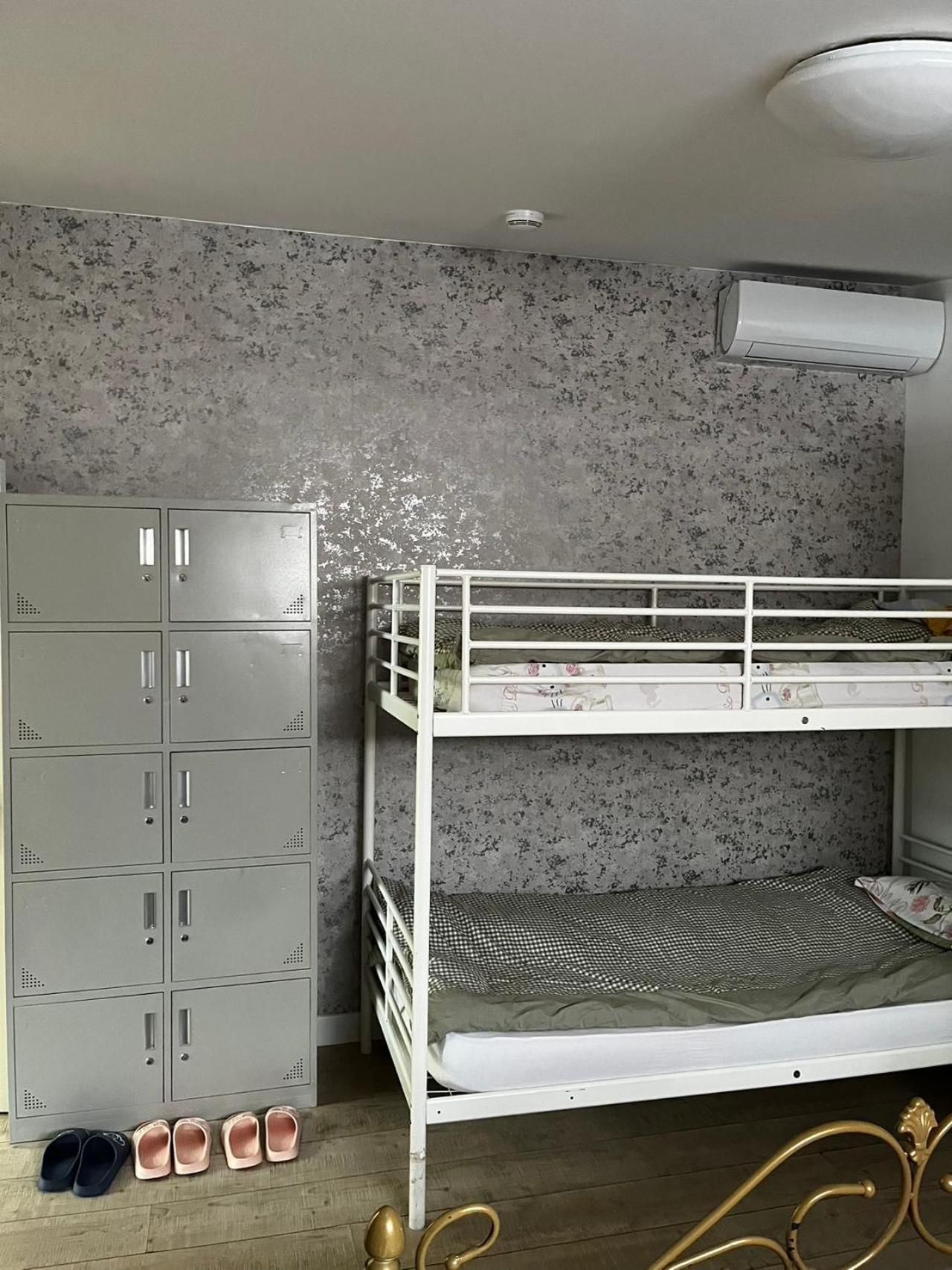 Single Bed in Female Dormitory Room