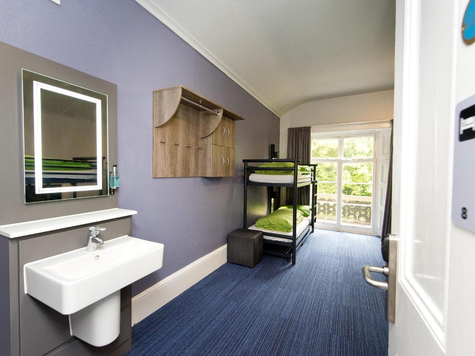 Bunk Bed in Male Dormitory Room with Shared Bathroom