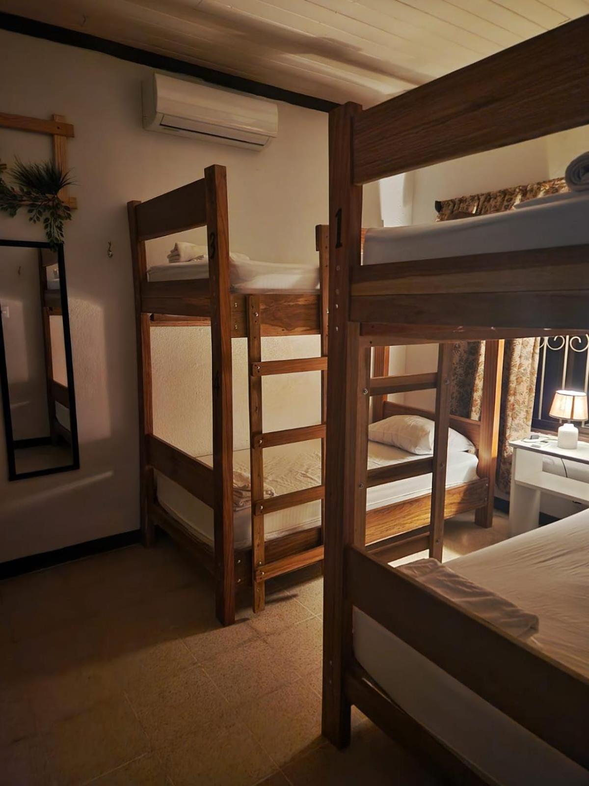 Economy Quadruple Room with Shared Bathroom