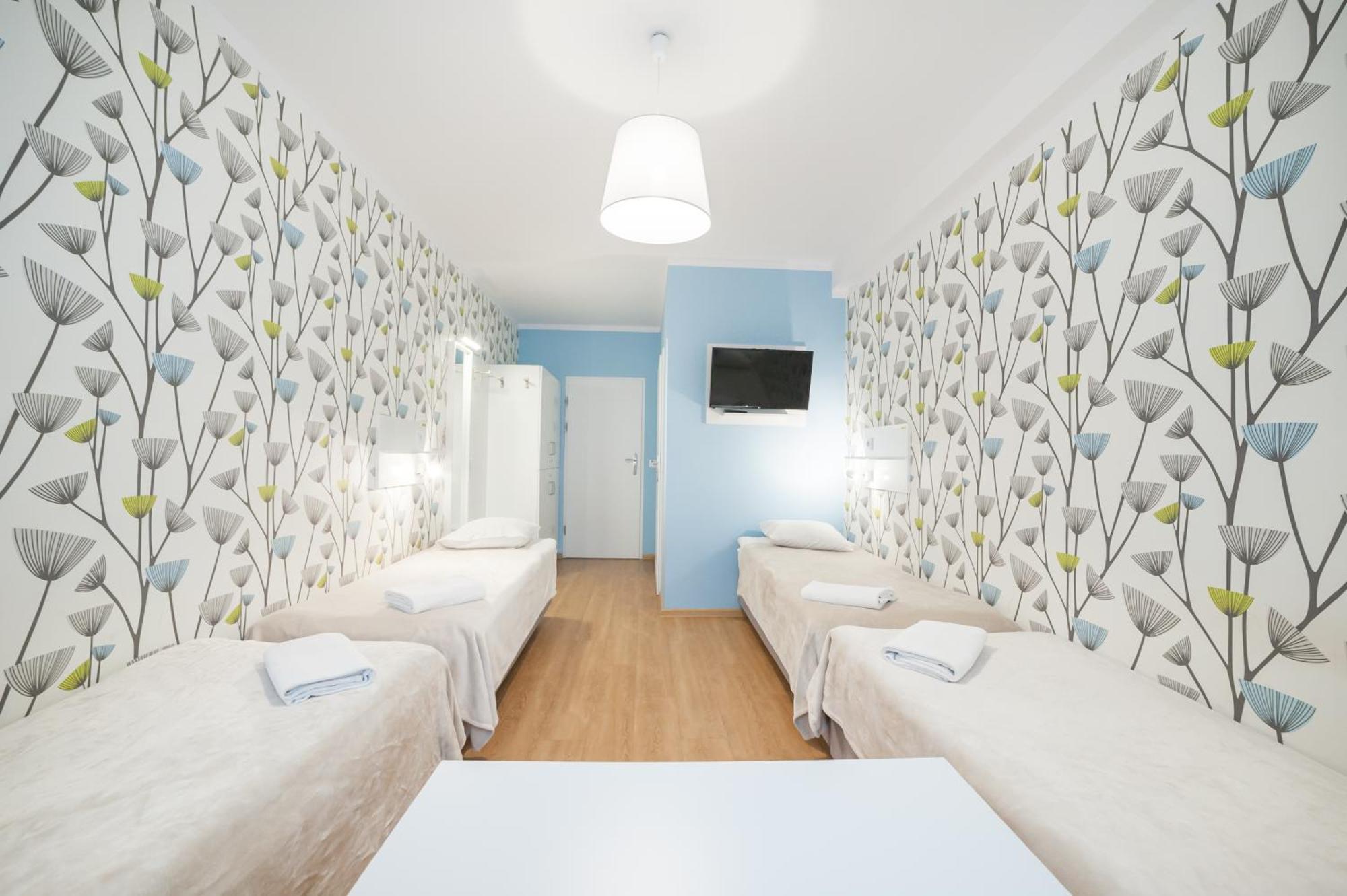 Deluxe Quadruple Room with Private Bathroom