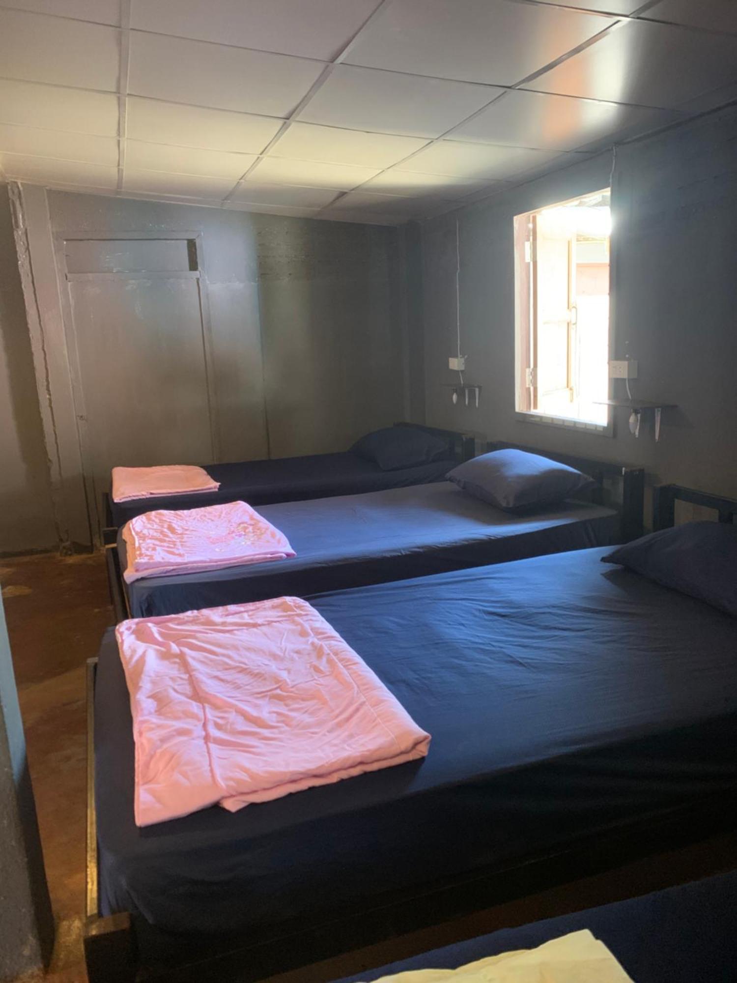 Single Bed in Dormitory Room