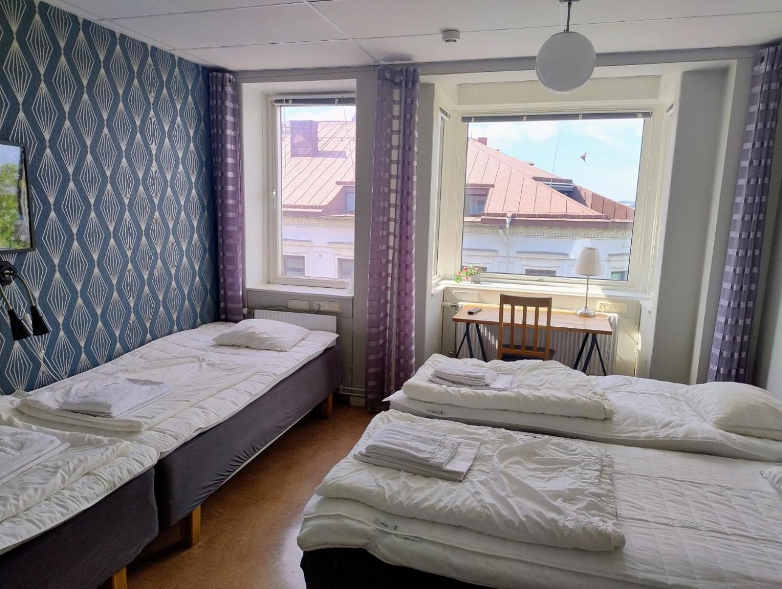 Quadruple Room with Shared Bathroom