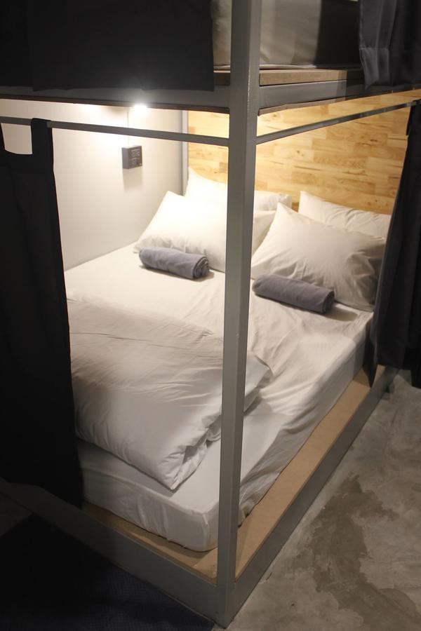 Economy Quadruple Room with Shared Bathroom (No Window)