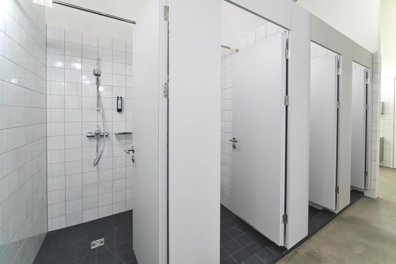 One Bedroom with four single beds and shared Bathroom